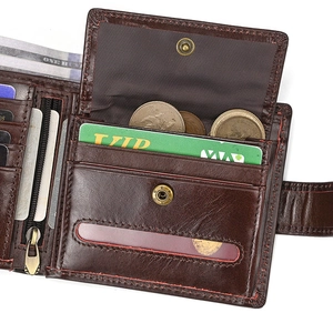 Close-up of genuine leather wallet with multiple card slots and a snap-button coin pocket
