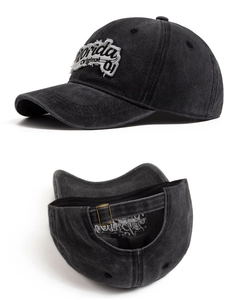 Detail showing vintage washed cotton baseball cap with Florida embroidery and metal buckle