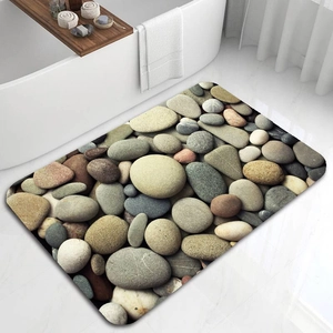 Detailed view of the 3D pebble pattern on the absorbent diatom mud bathroom mat
