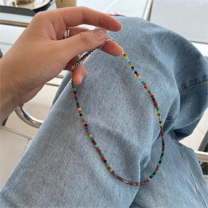 Colorful 925 sterling silver beaded necklace with adjustable chain shown in hand