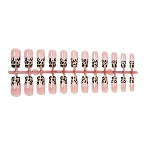Long coffin leopard print press-on nails set with glossy black and gold pattern finish