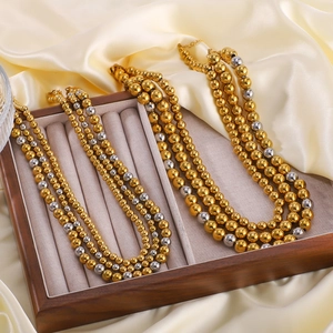 Multi-layer 18K gold and silver plated bead necklace and bracelet set in jewelry box