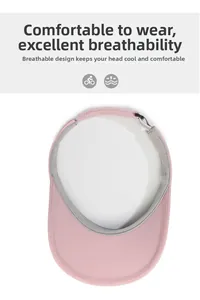 Close-up of pink sun visor with breathable mesh fabric and adjustable strap