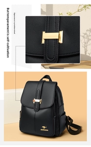 Close-up of golden H-shaped hardware and kangaroo logo on black lychee leather backpack