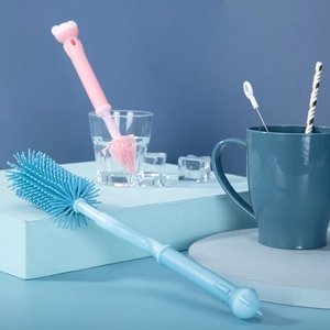 Detail view of 360° rotating silicone baby bottle brushes with cute animal handles