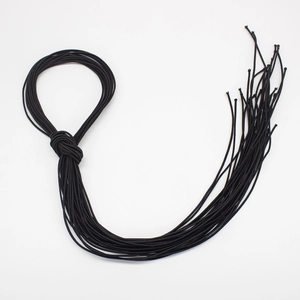 Detail of multi-strand black nylon cord with a secure knot for jewelry making DIY projects