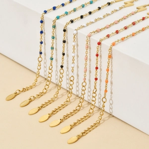 Detail of bohemian lightning beads bracelet in colorful stainless steel enamel finishes