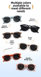 Multiple colors of round kids silicone sunglasses showing various frame shades and model codes