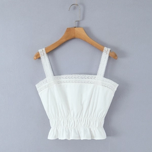 White lace camisole top featuring floral embroidery with elasticated waist and ruffle hem