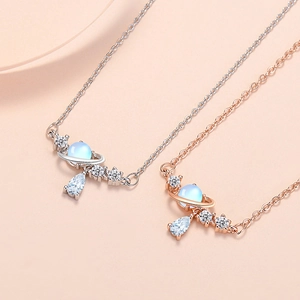 Planet moonstone necklaces in silver and rose gold finishes with zircon accents
