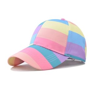 Detail view of the colorful rainbow striped cotton baseball cap with pastel macaroon tones
