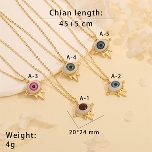 Detail view of 18K gold plated evil eye pendant necklaces in five colors with dimensions