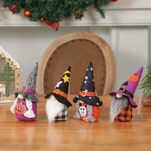 Set of four Halloween gnome plush dolls with spider web and skull patterns for decor
