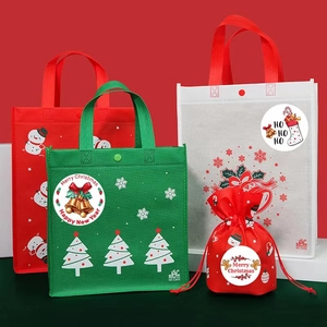 Assorted festive Christmas non-woven gift bags with Merry Christmas prints on red background