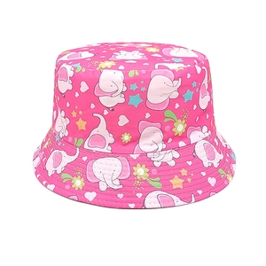 Detail of pink children's bucket hat featuring cute cartoon elephant and star patterns