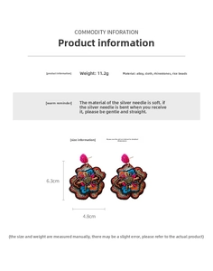 Detailed view of colorful flower embroidery earrings with rhinestones and seed beads