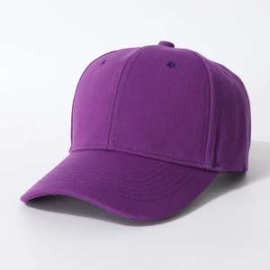Classic purple cotton baseball cap with curved brim and breathable holes on white background