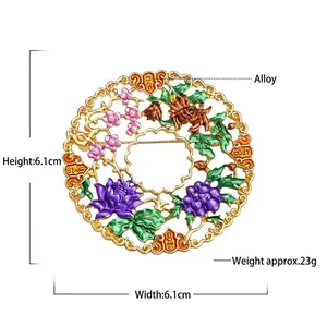 Detailed size view of a 6.1cm round floral enamel brooch with pink and purple petals