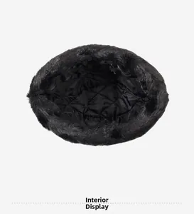 Detail view of winter warm cap featuring diamond quilted lining and faux fur trim