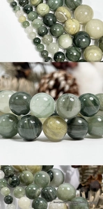 Macro detail of natural green rutilated quartz beads for DIY jewelry making and crafts