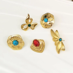 Five-piece vintage gold butterfly and leaf earrings set with colorful gemstones