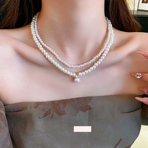French style double-layer pearl necklace with zircon pendant on model neck