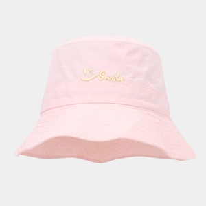 Close-up of pink quick-dry bucket hat featuring a yellow 3D Smile logo and lettering