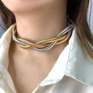Three-tone twisted Tubogas choker necklace in gold silver and rose gold stainless steel