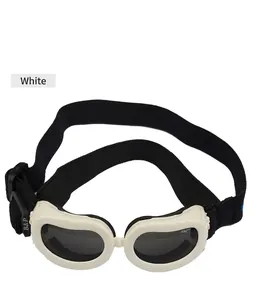 Detail view of white pet goggles featuring dark lenses and adjustable elastic strap
