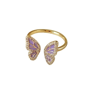 Golden butterfly open ring with purple enamel wings and sparkling diamond accents
