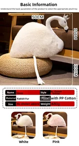 Detail view of plush swan dolls showing fabric specs, dimensions, and soft bunny velvet texture