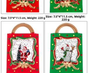 Detail view of 7.5x4x11.5cm Santa and Snowman water globes in festive gift bag shape