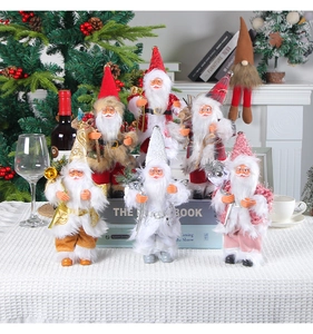 Detailed close-up of six distinct decorative 9-inch Santa Claus figurines in various colors