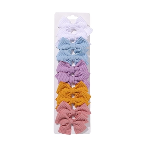 Set of 10 handmade waffle fabric bow hair clips for girls in pastel macaron colors