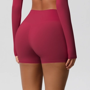 Rear view of high-waisted seamless dark red yoga shorts showcasing stretch and fit