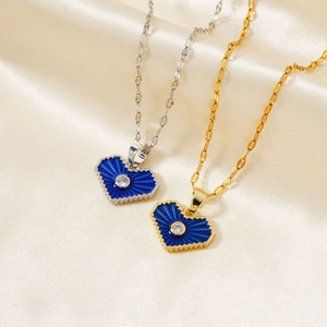 Blue heart enamel pendant necklace in gold and silver finish on champagne silk