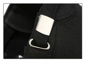 Detail of black wool flat cap featuring an adjustable silver metal buckle at the back