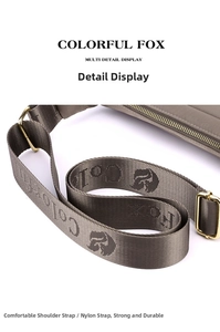 Close-up of durable nylon shoulder strap with brand jacquard and gold hardware