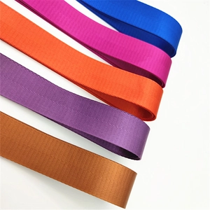 Detailed view of colorful woven replacement shoulder straps with high density twill texture