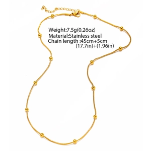 Detail view of gold bead bamboo chain necklace showing 45cm length and stainless steel specs