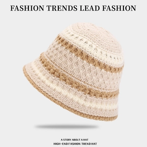 Striped knit bucket hat for women in cream and beige with crochet texture and hollow design