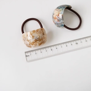 Acetate marble texture hair ties measurement showing 3.5cm width on white background