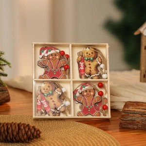 Detail of 12-piece wooden gingerbread man Christmas ornaments in a divided gift box