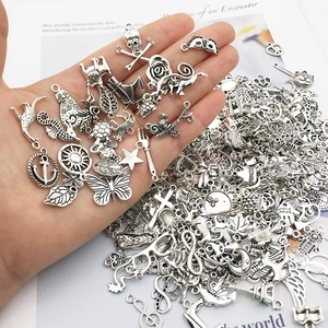 Mix of 300 antique silver alloy charms including butterfly and moon shapes for DIY jewelry