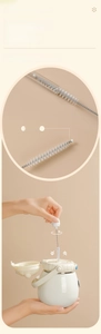 Macro view of nylon spiral straw brush with protective tip for cleaning thermal bottles
