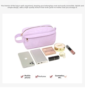 Detail view of a spacious purple corduroy cosmetic bag storing various makeup items