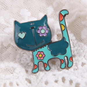 Cute cartoon cat enamel brooch with blue patterns and colorful flowers on lace background