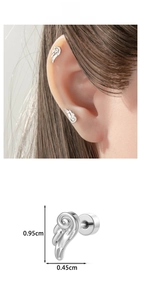 Macro shot of silver angel wing ear stud with dimensions 0.95cm x 0.45cm and screw back