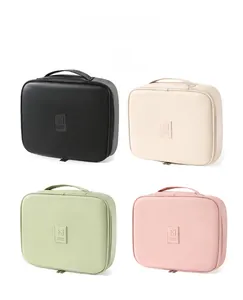 Detailed view of square PU leather travel makeup bags in four colors with carry handles