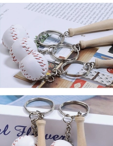 Close-up of mini baseball keychain showing PU leather texture and red stitching detail